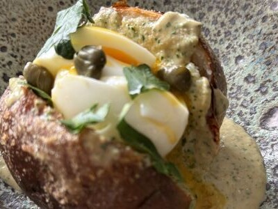 Jacket potatoes topped with egg and tonnato sauce, made with extra virgin olive oil